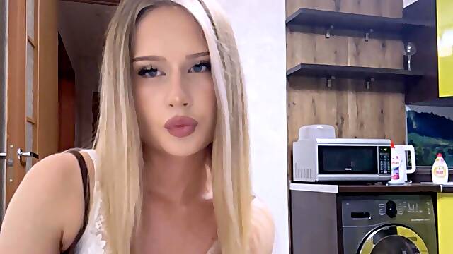 Stunning Blonde Teasing in Modern Kitchen