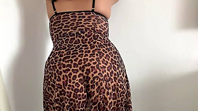 A sexy wife Dancing with a sexy dress and stockings and showing off her big natural tits with wide, big nipples