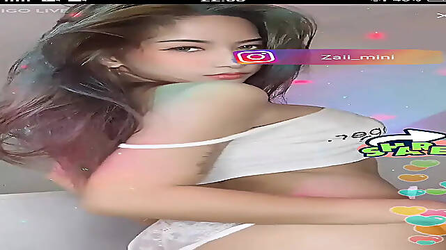 Sexy Thai babe shows off her moves