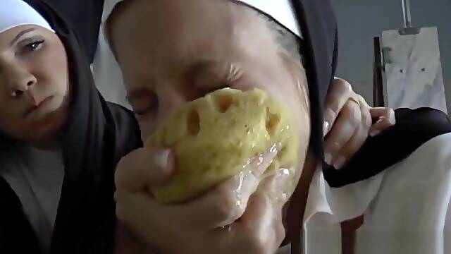 Fetish nun gets gagged