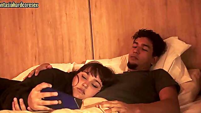 My stepsister lies down on my lap and lets me put my penis in her mouth