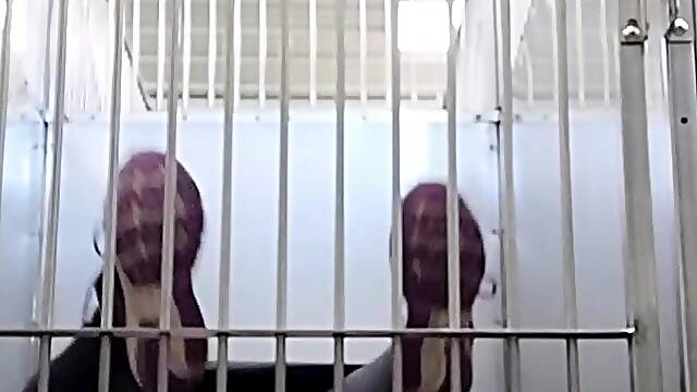 Risky Squirting In A Cage At Work