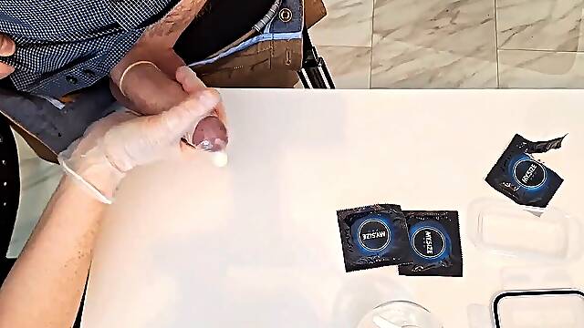 Nectar bank nurse milking a cum donation into a condom with latex gloves professional hand job cum shot