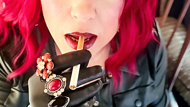 Your Mistress Tina Snua Dressed in Leather Chain Smoking 2 Cork Cigarettes